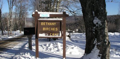 Camp sign in winter